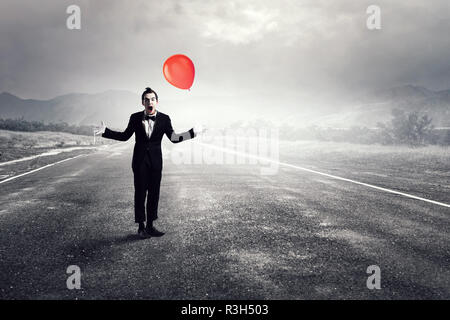 Junger Mann Mime. Mixed Media Stockfoto