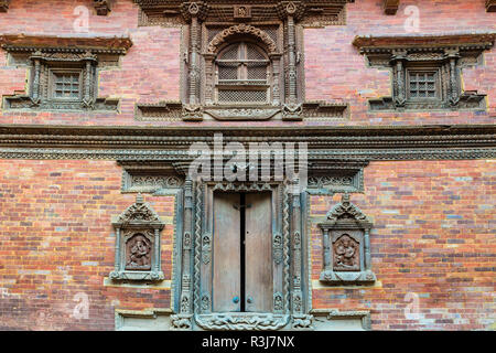 Mul Chowk Innenhof, Wand geschnitzte Statuen, Hanuman Dhoka Palast, Patan Durbar Square, Unesco Weltkulturerbe Stockfoto