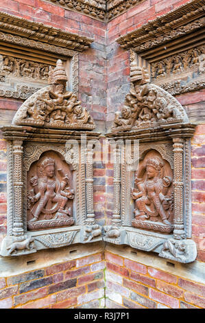 Mul Chowk Innenhof, Wand geschnitzte Statuen, Hanuman Dhoka Palast, Patan Durbar Square, Unesco Weltkulturerbe Stockfoto