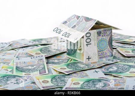 Haus mit polnischen Geld gebaut - 100 Zloty Stockfoto