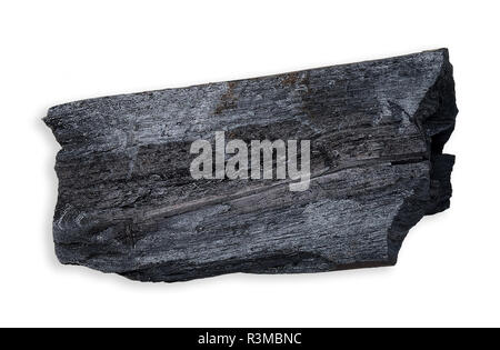 Holzkohle isoliert auf Weiss mit Freistellungspfaden. Stockfoto