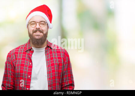 Jungen kaukasischen Mann mit Mütze über isolierte Hintergrund mit einem glücklichen und kühlen Lächeln auf dem Gesicht. Glückliche Person. Stockfoto