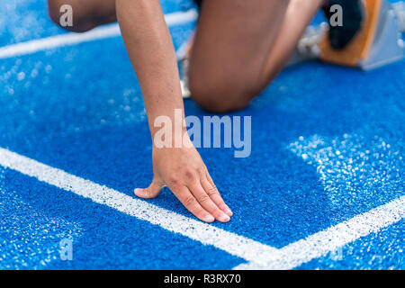 Detail der Läuferin in Grundstellung Stockfoto