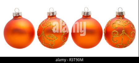 Vier orange Weihnachten Kugeln isoliert auf weißem Stockfoto