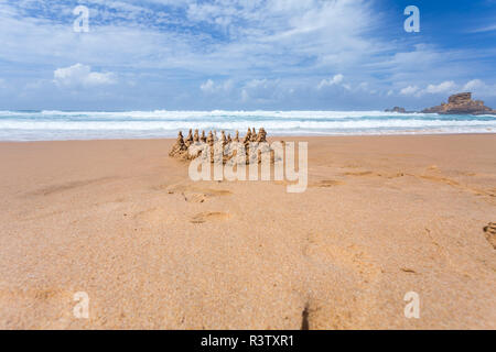 Sandburg am Strand Stockfoto