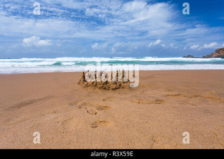 Sandburg am Strand Stockfoto