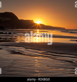 Sonnenaufgang über die Jurassic Coast in Sidmouth Stockfoto