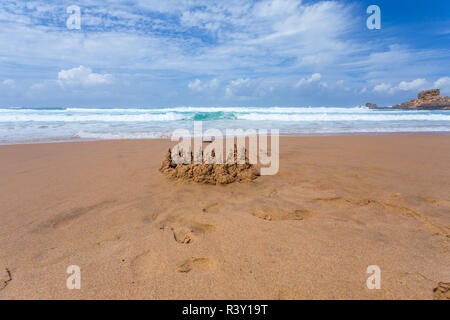 Sandburg am Strand Stockfoto