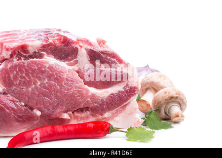 Stück rohes Fleisch mit Dekor aus auf Seite Stockfoto