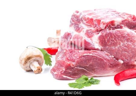 Stück rohes Fleisch mit Dekor aus auf Seite Stockfoto