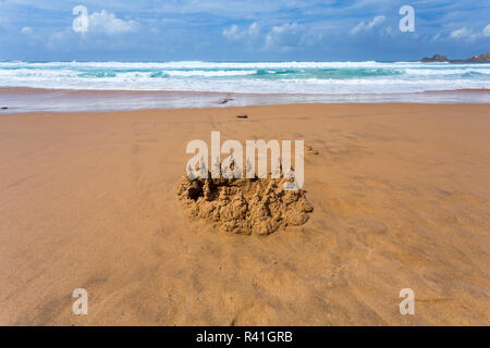 Sandburg am Strand Stockfoto