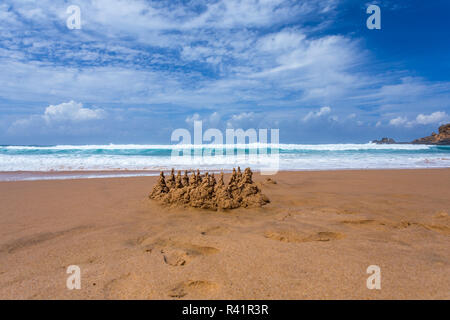 Sandburg am Strand Stockfoto