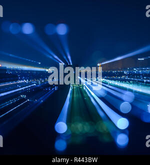 Abstrakte Zoom Blur Stadt bokeh Lichter Hintergrund Stockfoto