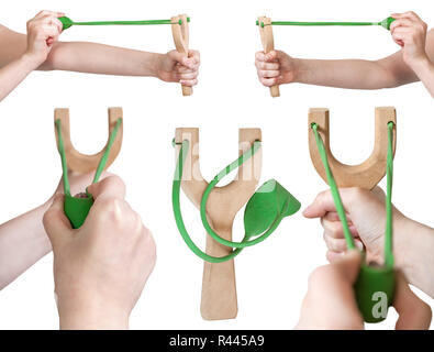 Hand mit einfachen Holzmöbeln slingshot Stockfoto