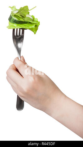 Hand dinning Gabel mit frischen grünen Salat Stockfoto