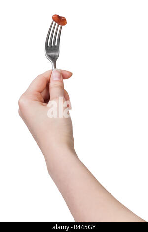 Hand dinning Gabel mit aufgespießt braune Bohne Stockfoto