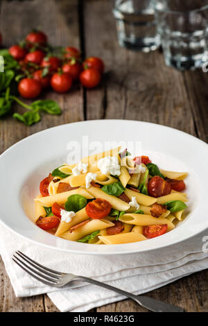 Tomaten und Speck Nudeln Stockfoto