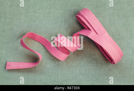 Rosa Baumwolle Bias binding tape Nahaufnahme Stockfoto