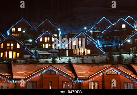 Holz-Chalet im winter Stockfoto