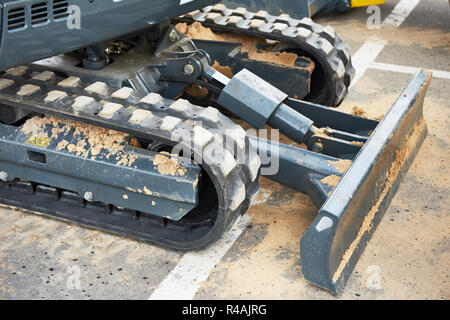 Crawler mini Traktor mit Lader Stockfoto