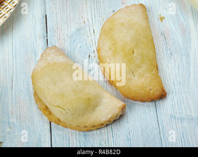 Welsh Oggie, Walisisch, Küche, traditionelle Cornish pasty über Welsh Lamb und Lauch, Britische Traditionelle verschiedene Gerichte, Ansicht von oben. Stockfoto