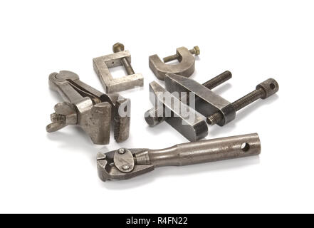 Die alte Schraube klemmen auf einem hellen Hintergrund Stockfoto