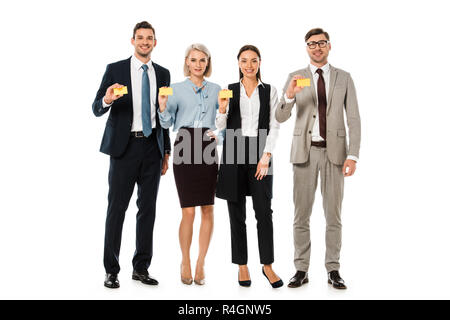 Executive Business Team Holding leer Visitenkarten isoliert auf weißem Stockfoto
