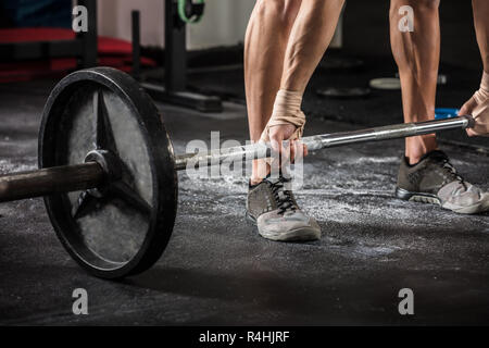 Person anheben Barbell Stockfoto