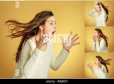 Porträt der jungen Frau mit schockiert Gesichtsausdruck Stockfoto