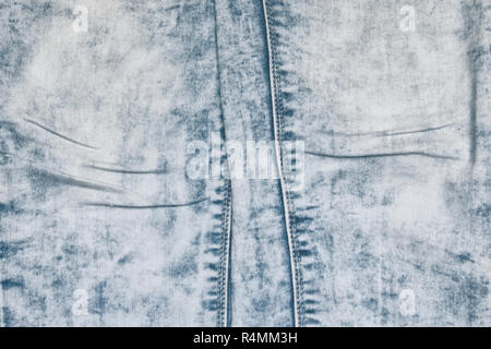 Acid washed jeans mit Falten auf einen Schoß denim Stockfoto