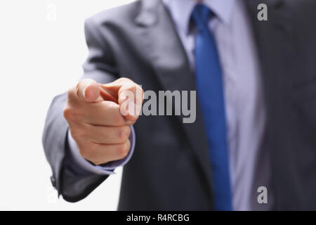 Geschäftsmann weist mit dem Finger auf jemand, Stockfoto