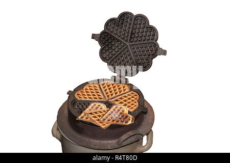 Antike Gusseisen Cinnamon Stick Eisen. Stockfoto