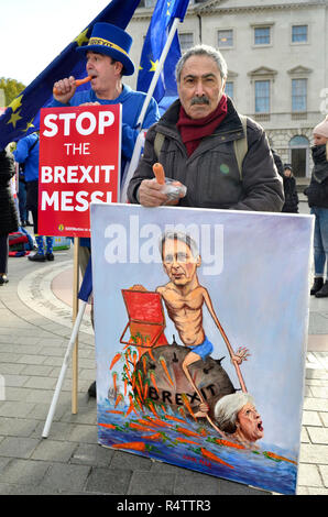 Kaya Mar-politischen Karikaturisten - mit einem seiner Gemälde Brexit Philip Hammond mit einem Budget Box voller Karotten und Theresa May, sinkt. Steve Br Stockfoto