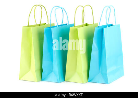 Grün und Blau Einkaufstaschen auf weißem Hintergrund. Stockfoto