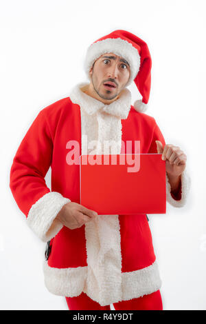 Santa Claus mit Notebook in seinen Händen Stockfoto