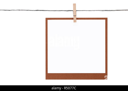 Foto Rahmen auf dem Seil mit wäscheklammer Hung Stockfoto