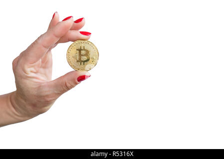 Virtuelles Geld goldene bitcoin Frauen hand mit Rote nägel Finger auf weißem Hintergrund Stockfoto