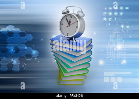 Wecker auf Bücher Stockfoto