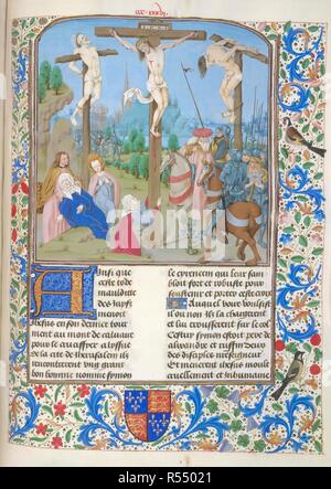 Die Kreuzigung. Bibel Historiale von Edward IV. S. Niederlande [Brügge]; circa 1479. [Ganze folio] Christus am Kreuz zwischen den beiden Räubern, mit den drei Maries. In der Landschaft, mit Soldaten, und eine Stadt, Jerusalem, im Hintergrund. Text Anfang dekoriert mit ersten 'A'. Grenzen mit Foliate Dekoration; in der unteren Marge, die Arme von König Edward IV Bild aus Bibel Historiale von Edward IV Ursprünglich veröffentlichte/in S. Niederlande [Brügge] hergestellt; circa 1479. . Quelle: Royal 15 D I, f. 353. Sprache: Französisch. Stockfoto