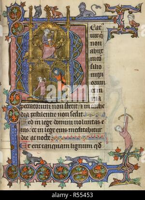 Historisierte Initiale 'B' (eatus) mit David spielt die Harfe, David gegen Goliath, und einen dreiseitigen Rand mit Tieren und Grotesken. Psalter und Stunden, Verwendung von Arras. Frankreich, N. (Arras); c. 1300. Quelle: Yates Thompson 15, f 20. Sprache: Latein, mit einigen französischen. Stockfoto