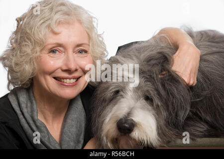 Frau mit ihrem Hund Stockfoto