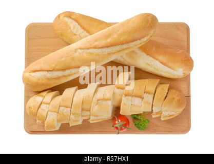 Ganze und aufgeschnittene Baguettes Stockfoto