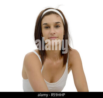 Schöne junge Frau mit weißem Stirnband im Haar Stockfoto