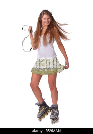 Das schöne Mädchen in rollerskates Stockfoto