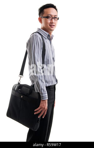 Jungen asiatischen Mann mit Laptop Tasche Stockfoto