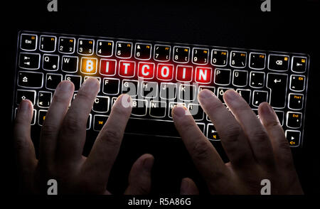 Bitcoin Tastatur ist durch Hacker betrieben. Stockfoto