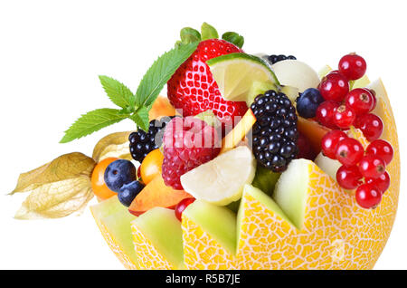Früchte der Saison, in einem verrechnet Melone gefüllt Stockfoto