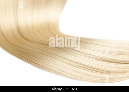 Nahaufnahme auf luxuriöse gerade glänzend blondes Haar Stockfoto