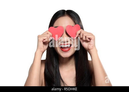 Schöne asiatische Mädchen mit roten Herzen Stockfoto