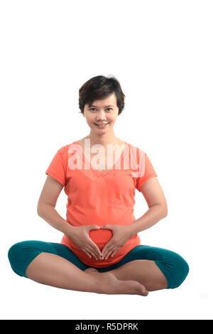 Asiatische Schwangere Yoga Stockfoto
